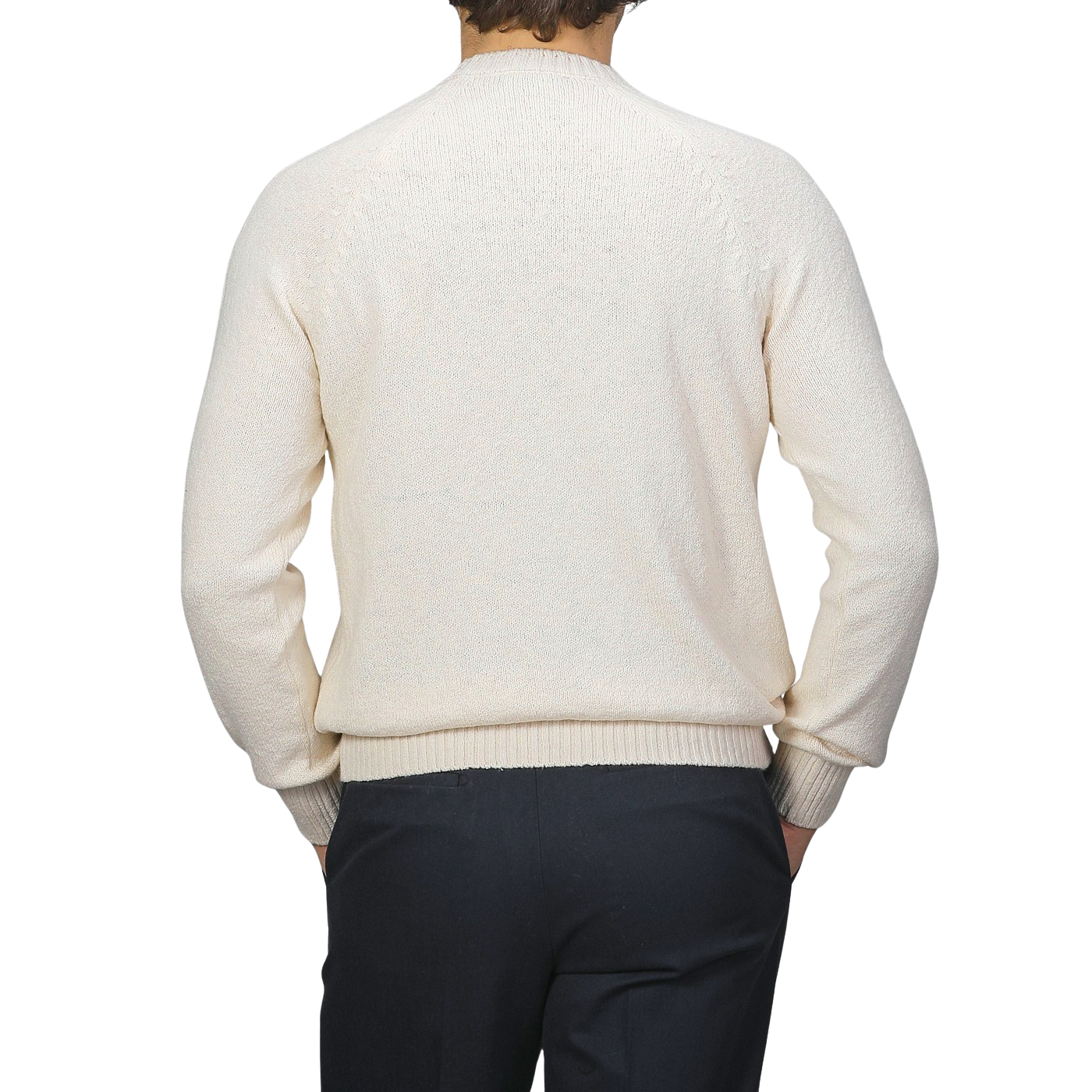 A person in a Gran Sasso Cream Cotton Boucle Crewneck Sweater and dark pants is facing away.