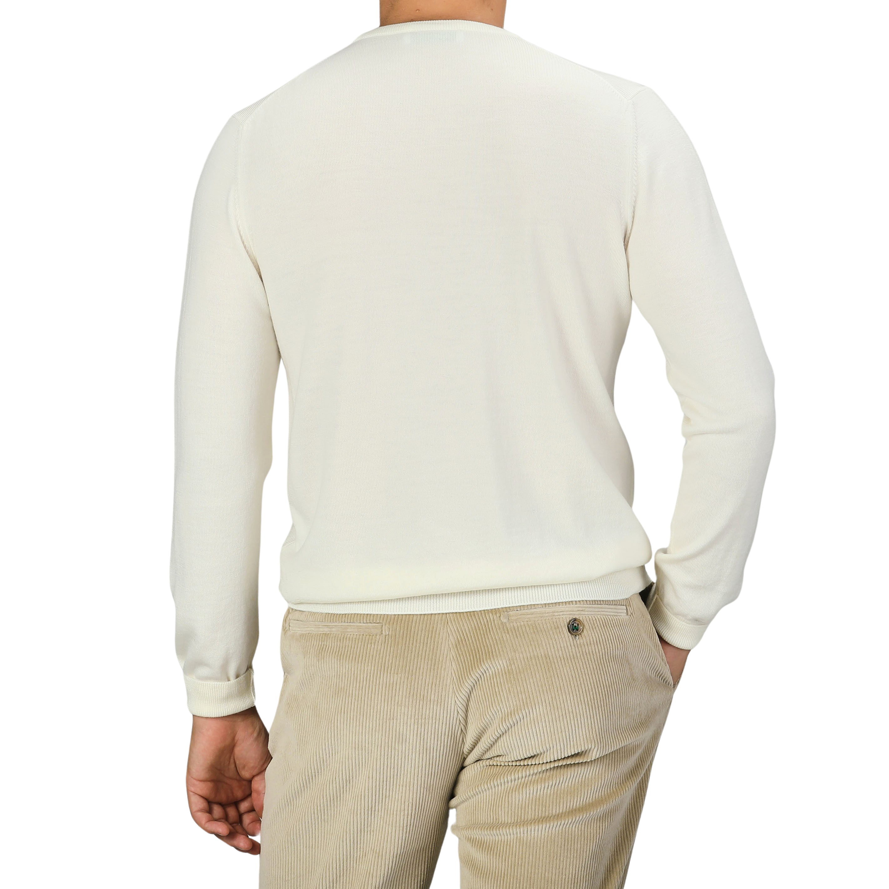 A person wearing a Cream Extra Fine Merino Crew Neck by Gran Sasso and beige corduroy pants, viewed from the back against a plain black background, exemplifies the versatility of a multi-purpose wardrobe.