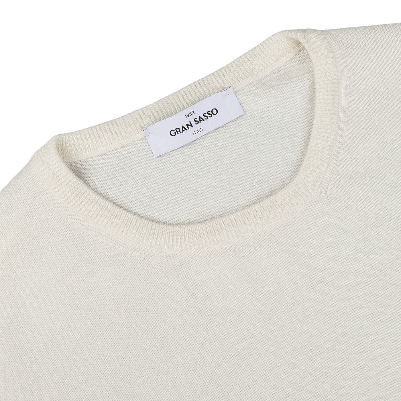 A close-up of the Gran Sasso Cream Extra Fine Merino Crew Neck sweater, known for its high-quality merino wool, featuring a round neckline and a visible brand label. This piece is perfect for any versatile wardrobe.