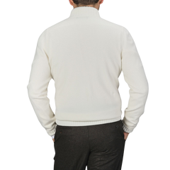 A person wearing a Cream Felted Cashmere Zip Cardigan by Gran Sasso and dark pants is shown from the back against a plain background.