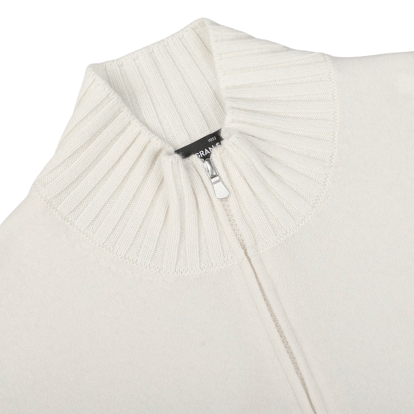 Close-up of the Cream Felted Cashmere Zip Cardigan by Gran Sasso, featuring a high, ribbed collar. The zipper is partially unzipped, revealing a black tag. This contemporary fit includes felted cashmere for added warmth and luxury.