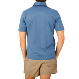 A man in a Dark Blue Cotton Filo Scozia Polo Shirt by Gran Sasso.