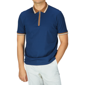 A man in a high-quality Gran Sasso Dark Blue Filo Scozia Zip Polo Shirt.