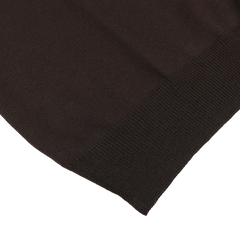 Close-up of the hem of the Dark Brown Extra Fine Merino Crew Neck by Gran Sasso, highlighting a neat, even weave pattern with slight texture and merino quality.