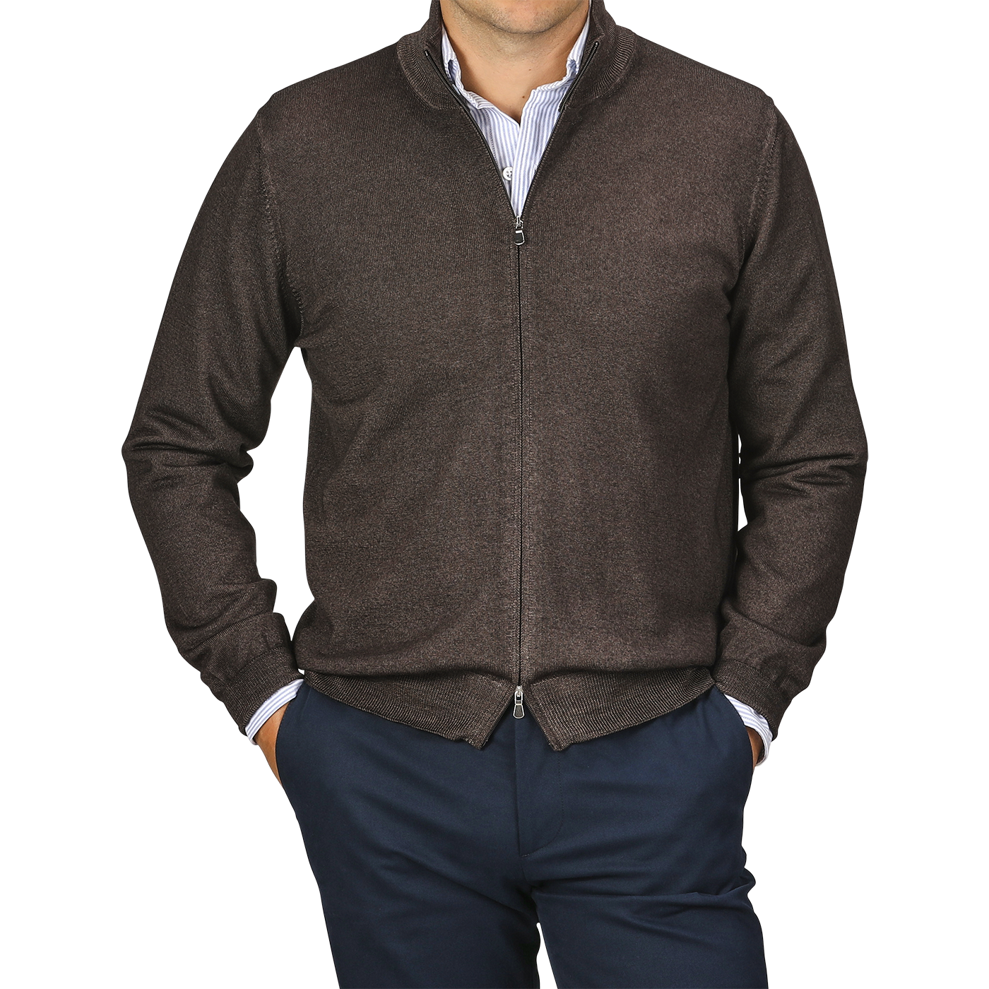 A person wearing a Gran Sasso Dark Brown Vintage Merino Zip Cardigan, a white and blue striped shirt, and dark blue pants, with their hands in their pockets. The background is transparent.