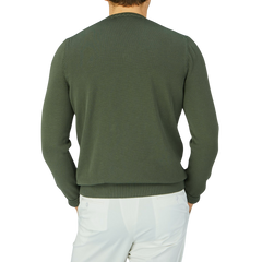 The back view of a man wearing a Gran Sasso Dark Green Egyptian Cotton Crewneck Sweater.