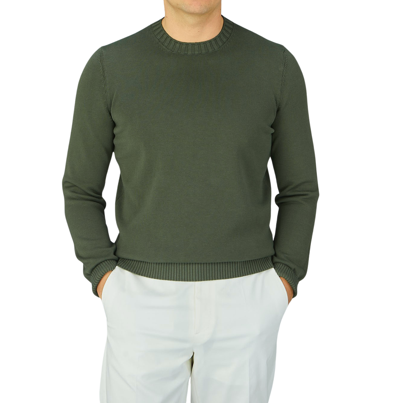 A man wearing a Gran Sasso Dark Green Egyptian Cotton Crewneck Sweater, paired with white pants.