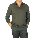 A man in a Gran Sasso Dark Green Knitted Linen LS Polo Shirt posing for a photo.