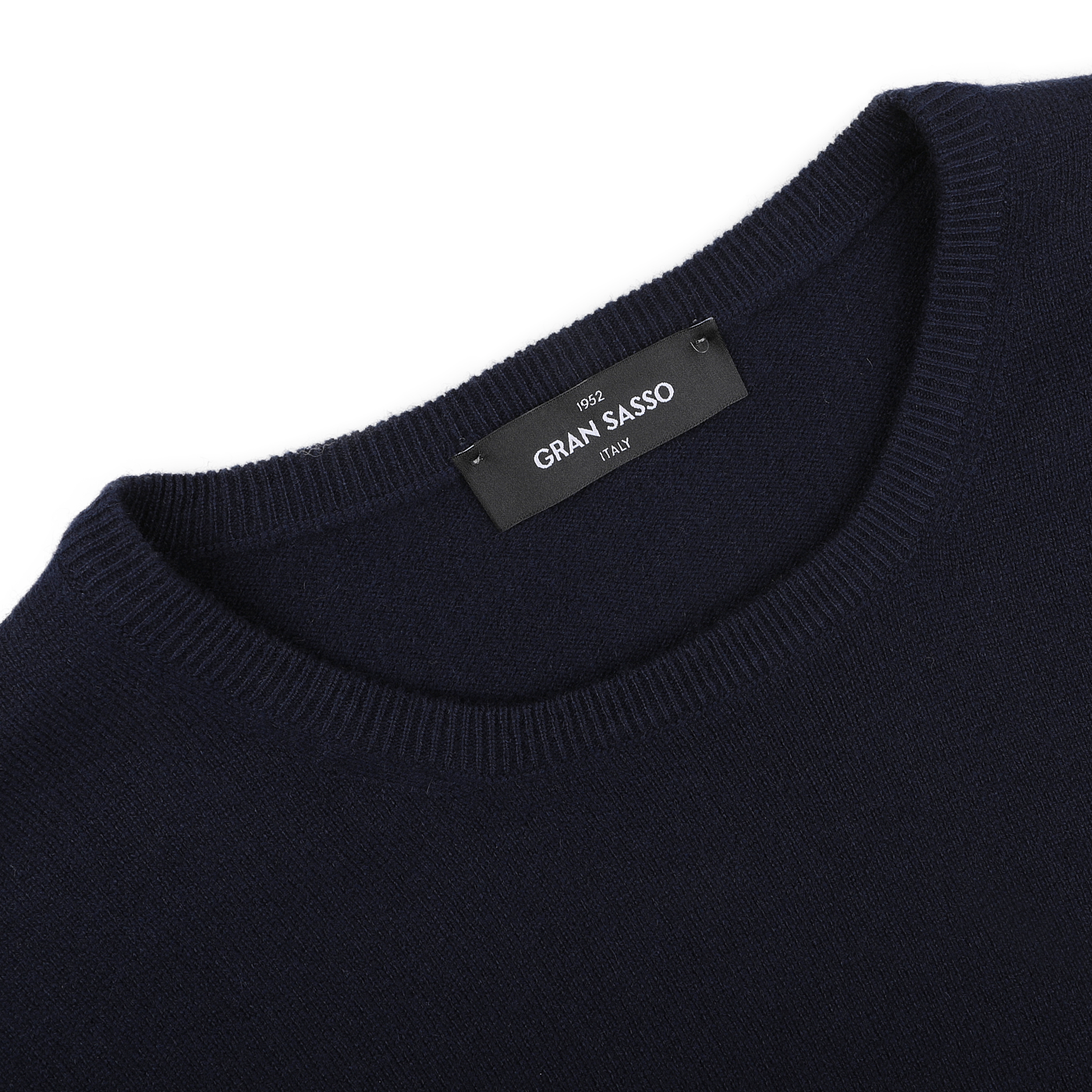 Close-up of the Dark Navy Cashmere Crewneck Sweater, featuring the 'Gran Sasso' label on the inside collar.