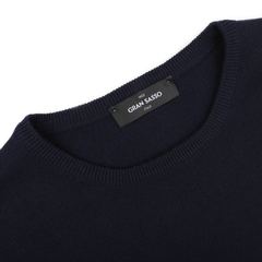 Close-up of the Dark Navy Cashmere Crewneck Sweater, featuring the 'Gran Sasso' label on the inside collar.