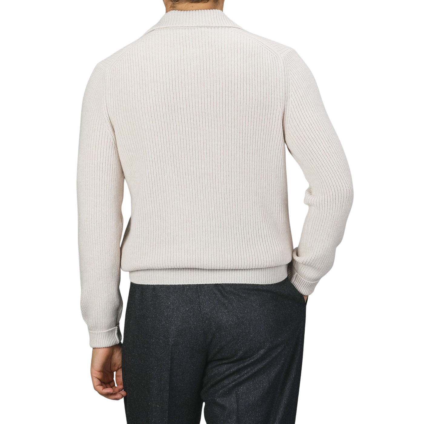 A person facing away, wearing a Gran Sasso Ecru Beige Chunky Knit Wool Polo Shirt made of super Geelong wool and dark trousers. The background is plain and neutral.