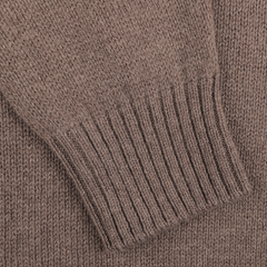 Close-up of a Gran Sasso Fawn Brown Air Wool Rollneck sleeve, highlighting the ribbed cuff detailing crafted from soft air wool.