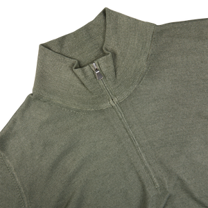 A close up of a Grass Green Vintage Merino Wool 1/4 Zip Sweater with a zipper by Gran Sasso.