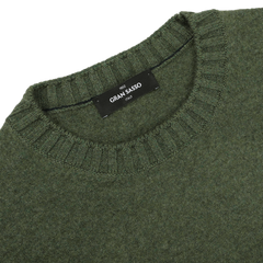 Green felted cashmere crewneck sweater by Gran Sasso, showcasing a ribbed neckline and a visible brand label on the inside.