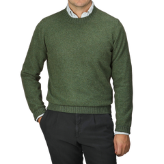 A person wearing a Green Felted Cashmere Crewneck Sweater by Gran Sasso over a collared shirt with black pants, embodying the classic style.