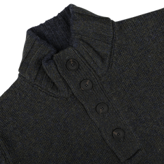 Green melange wool quarter button sweater with a high collar, featuring four black buttons along the front, made from soft merino wool by Gran Sasso.