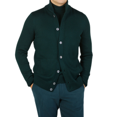 A man wearing a Green Merino Wool Button Cardigan by Gran Sasso.