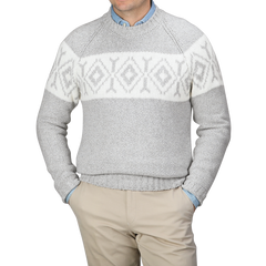 A person wearing a Gran Sasso Grey Eco Cashmere Norwegian Crewneck Sweater paired with beige pants.