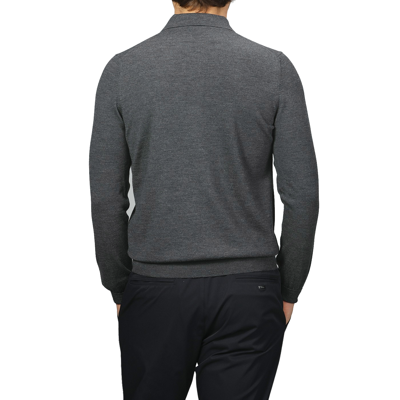 A man in a Gran Sasso grey Extra Fine Merino Wool Polo Shirt and black pants stands with his back to the camera against a neutral backdrop.