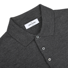 The Grey Extra Fine Merino Wool Polo Shirt by Gran Sasso features a button-up front and brand label on the neckline.