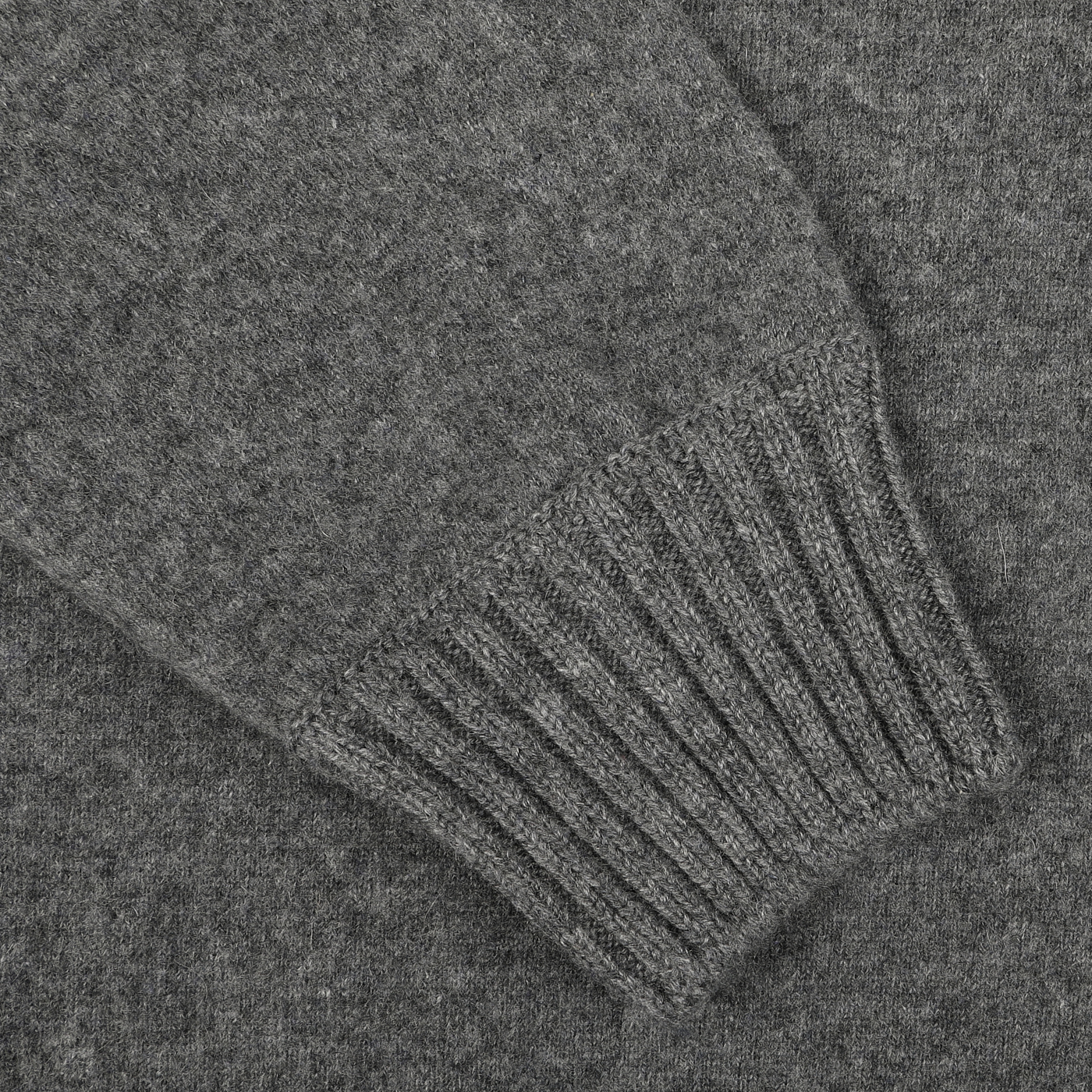 Close-up of a Gran Sasso Grey Felted Cashmere Crewneck Sweater sleeve with ribbed cuff.