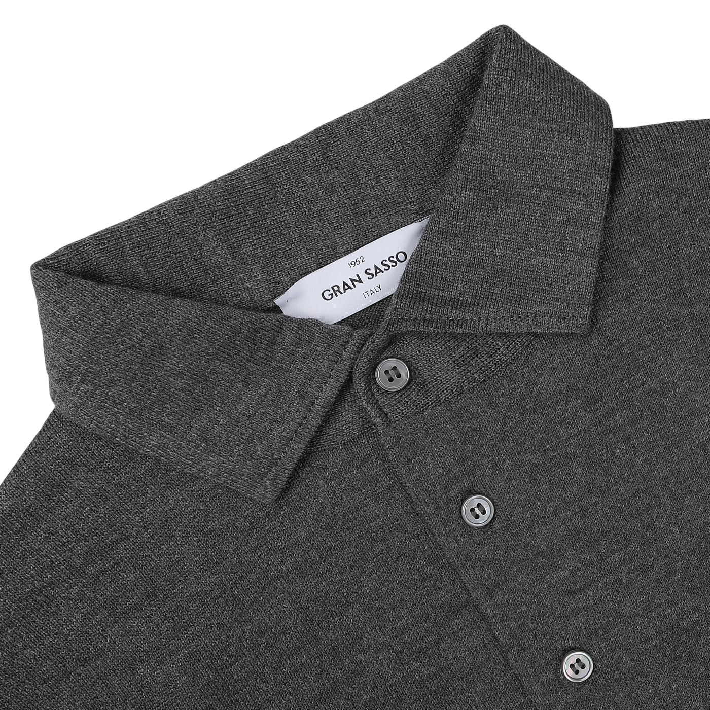 Close-up of a Gran Sasso Grey Merino Wool One-Piece Collar Polo Shirt, focusing on the collar and three buttons. The fabric appears textured and the inside label is partially visible, showcasing its extra-fine merino wool quality.