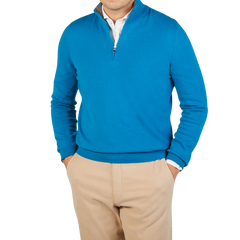 A man wearing a Hot Blue Cashmere 1/4 Zip Sweater by Gran Sasso.