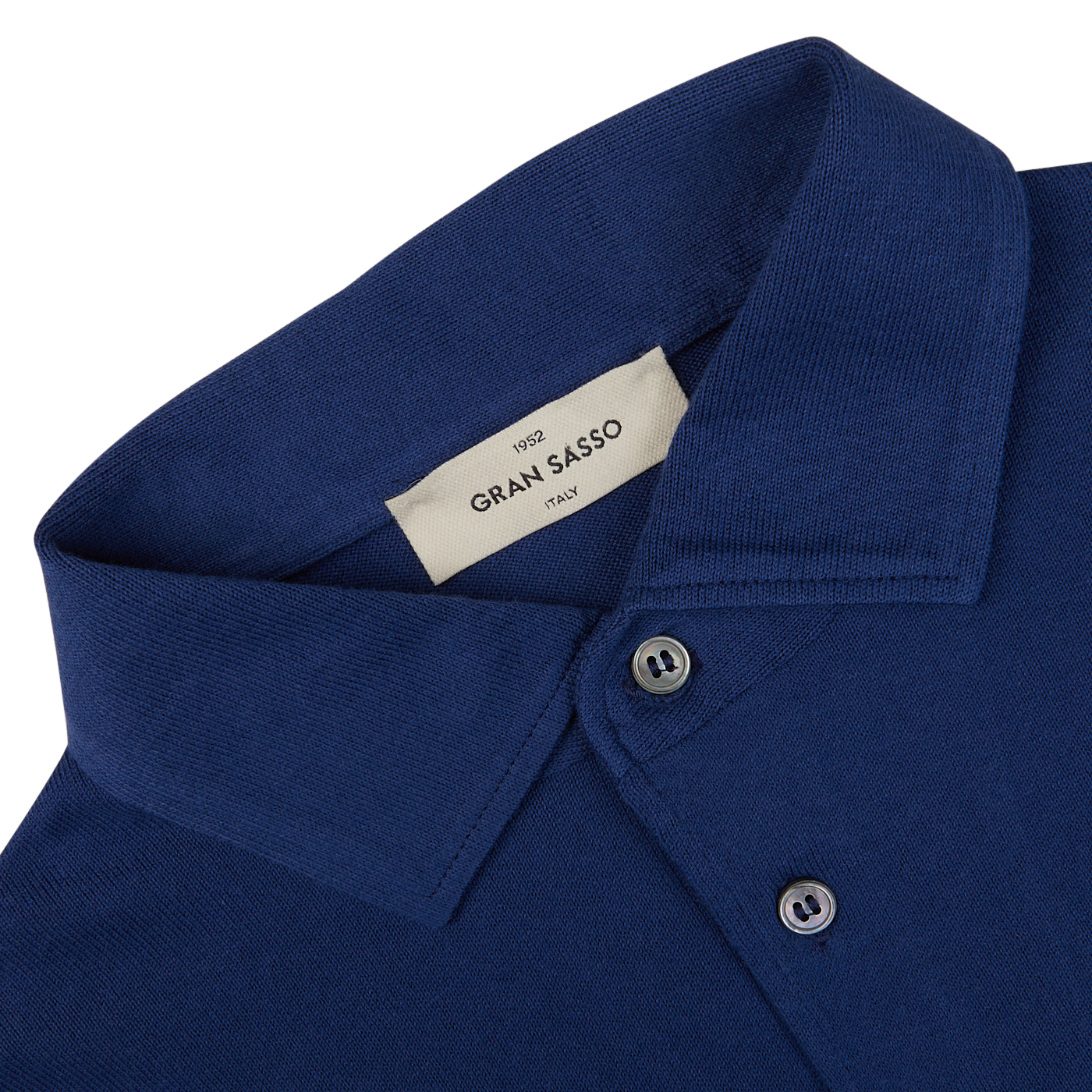 Close-up of an Indigo Blue Organic Cotton LS Polo Shirt collar with a Gran Sasso label.