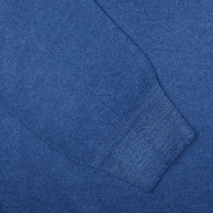 A close up of a Gran Sasso Indigo Blue Vintage Merino Wool 1/4 Zip Sweater.