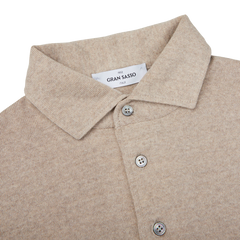 A Light Beige Merino Wool One-Piece Collar Polo Shirt with buttons on the collar, made by Gran Sasso.