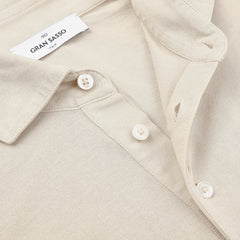 A close-up of Gran Sasso's Light Beige Washed Cotton Popover Shirt, showcasing its button-down collar and button details.