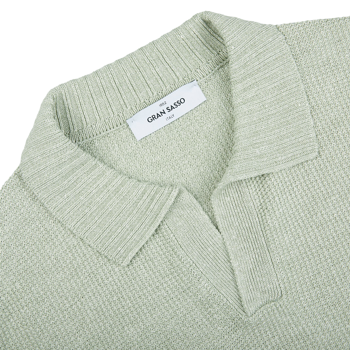 A close up of a Gran Sasso Light Green Cotton Linen Polo Shirt.