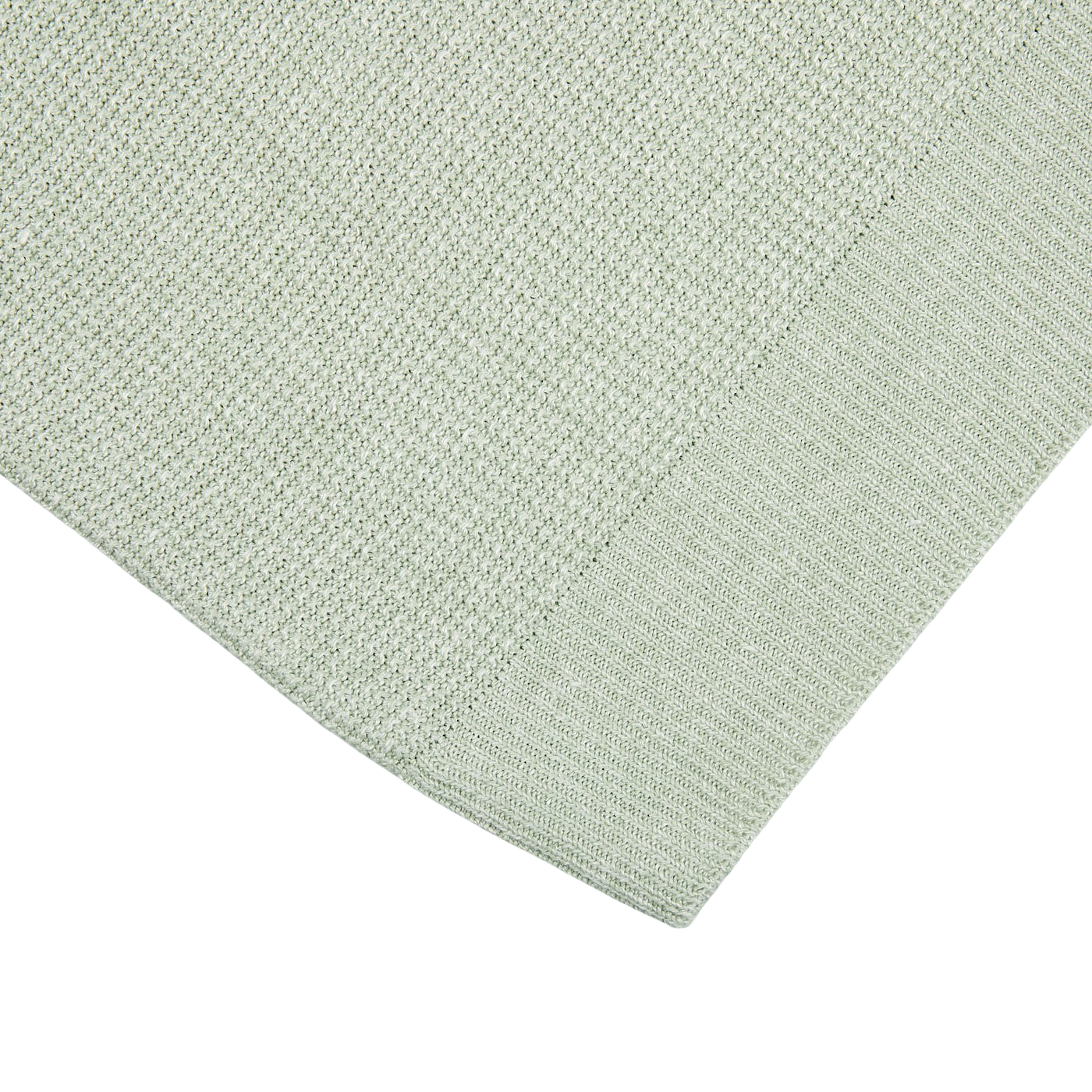 A light green Gran Sasso woven blanket on a white surface.