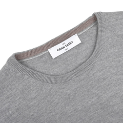 The Light Grey Extra Fine Merino Crew Neck by Gran Sasso features a visible inside collar label, ideal for classic business attire.