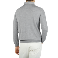 The back view of a man wearing a Light Grey Merino Wool One-Piece Collar Polo Shirt made by Gran Sasso.