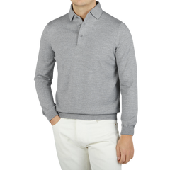 A man stylishly dressed in a Gran Sasso Light Grey Merino Wool One-Piece Collar Polo Shirt.