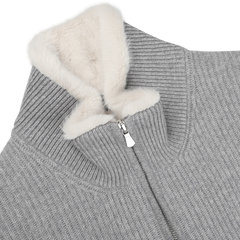 Light Grey Faux Fur Lined Cashmere Blouson by Gran Sasso, featuring a gray ribbed design and white faux fur collar, elegantly displayed on a light surface.