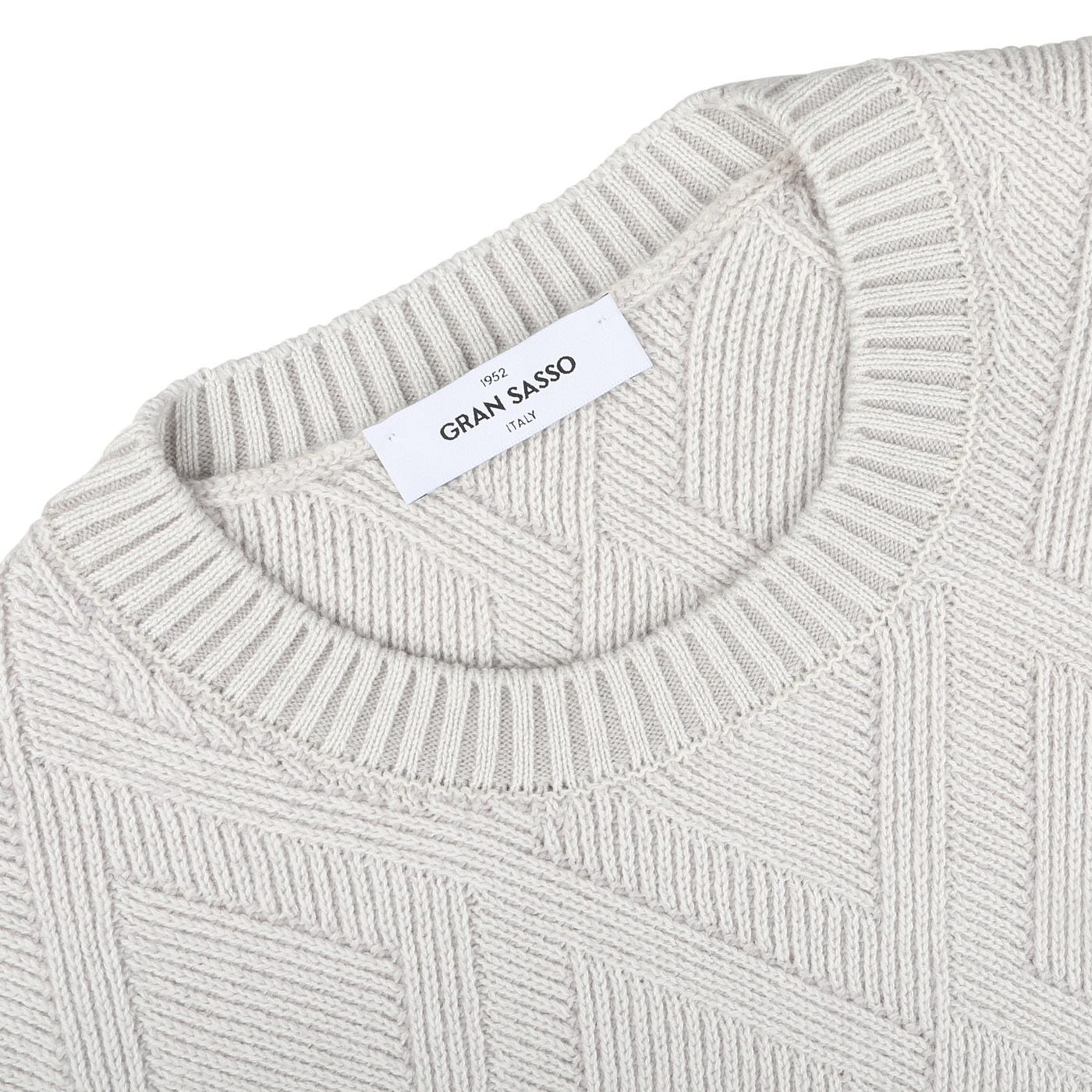 Close-up of the Gran Sasso Light Grey Wool Cashmere Diamond Knit Sweater, highlighting its durable and comfortable textured diamond knit pattern and featuring a white label at the neckline.