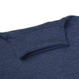 A Mid Blue Extra Fine Merino Roll Neck sweater with a roll neck by Gran Sasso.