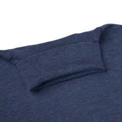 A Mid Blue Extra Fine Merino Roll Neck sweater with a roll neck by Gran Sasso.