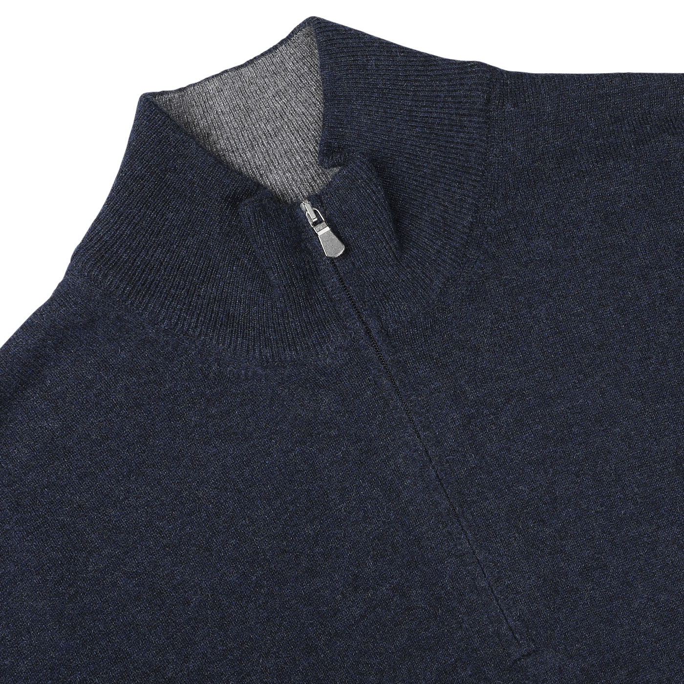 Close-up of a Gran Sasso Navy Blue Cashmere 1/4 Zip Sweater, displayed on a flat surface.