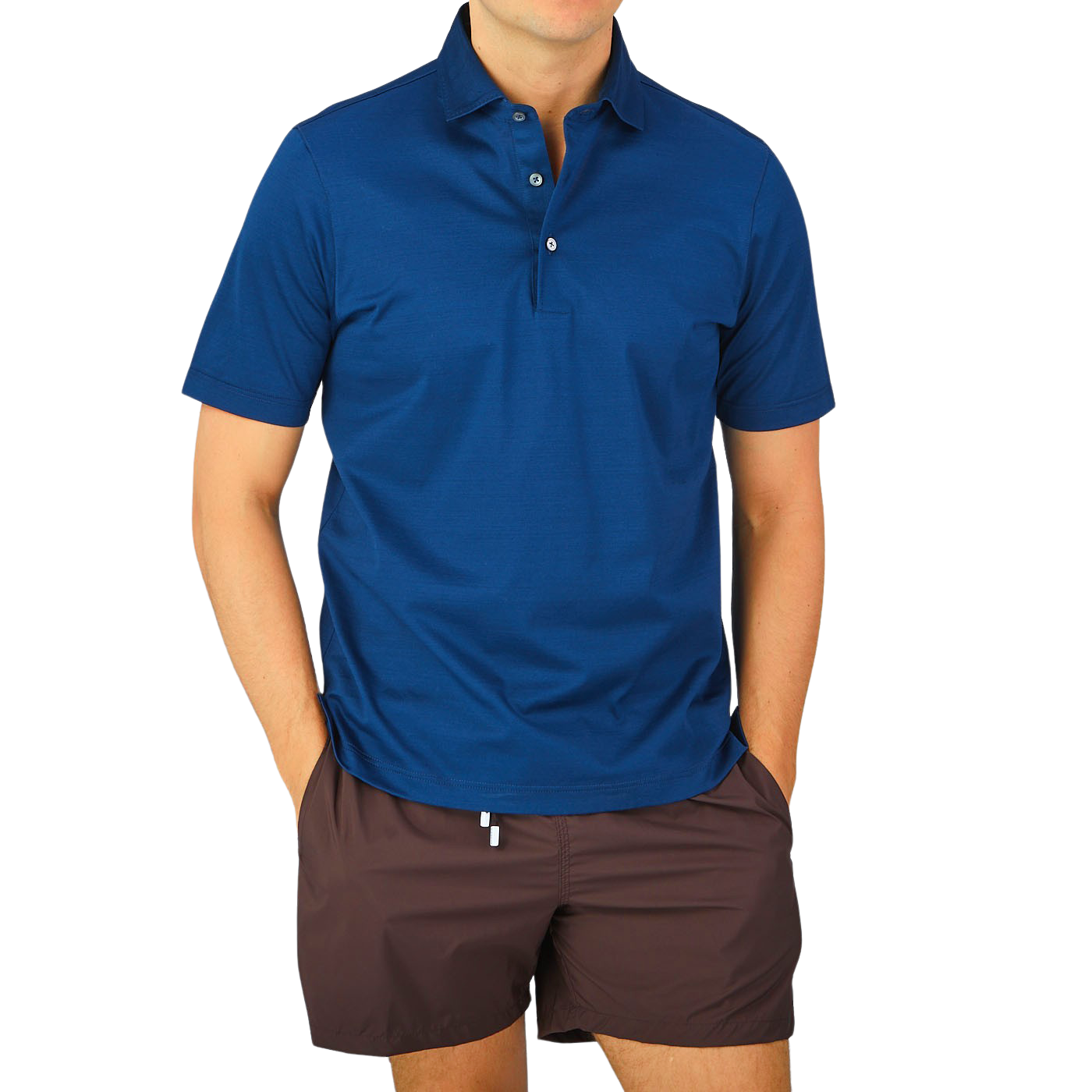 A man wearing a Navy Blue Cotton Filo Scozia Polo Shirt by Gran Sasso.