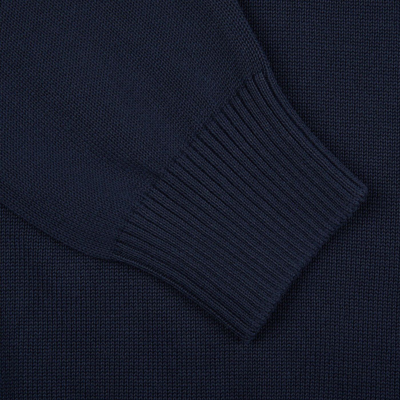 A close up image of a Gran Sasso navy blue Egyptian Cotton crewneck sweater.