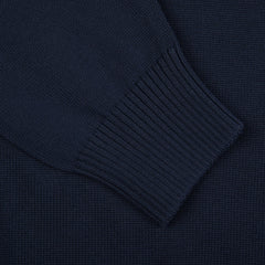 A close up image of a Gran Sasso navy blue Egyptian Cotton crewneck sweater.