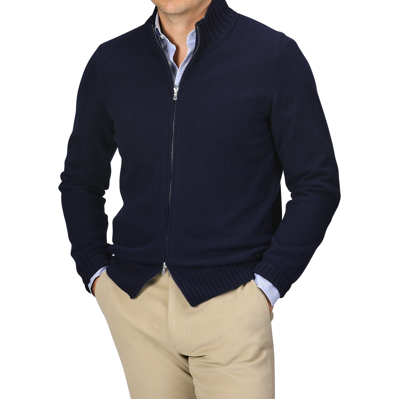 A person wearing a navy blue Felted Cashmere Zip Cardigan by Gran Sasso in a contemporary fit over a light blue shirt and beige pants stands with hands in pockets, facing forward.