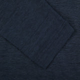 A close up of a Gran Sasso Navy Blue Knitted Linen LS Polo Shirt.