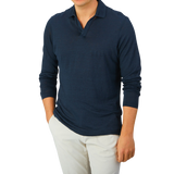 A man wearing a Gran Sasso Navy Blue Knitted Linen LS Polo Shirt.