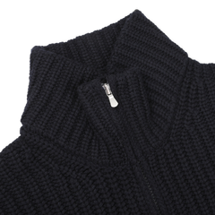 Close-up of a textured, navy blue Wool Cashmere Heavy Knit Cardigan by Gran Sasso, featuring a zippered design and a high collar.