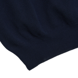 A close up of a Gran Sasso Navy Fresh Cotton Mesh Polo Shirt with high breathability.