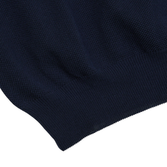 A close up of a Gran Sasso Navy Fresh Cotton Mesh Polo Shirt with high breathability.